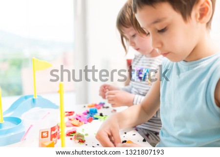 Two kids playing at home