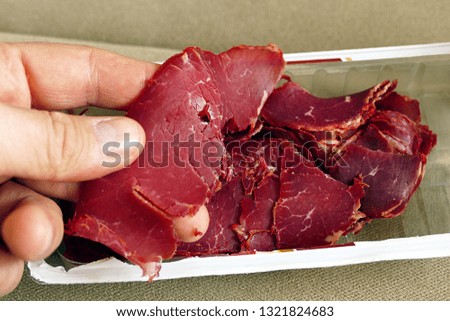 thin thinly sliced veal bacon, close-up,
veal bacon, thinly sliced veal bacon, white background
