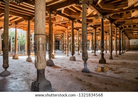 Djuma mosque is one of the main sights of ancient Khiva Royalty-Free Stock Photo #1321834568