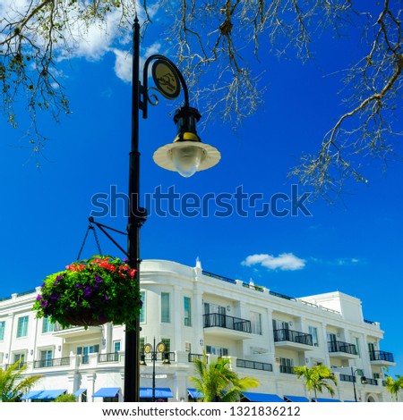 Scenic fifth avenue cityscape in the popular downtown district in Naples, Florida.