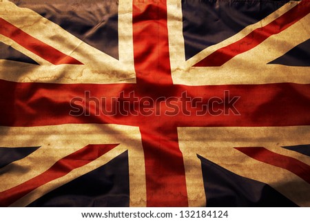 Closeup of grunge Union Jack flag Royalty-Free Stock Photo #132184124