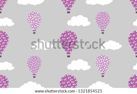 Seamless vector background with hot air balloons.