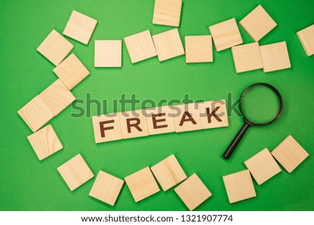 Freak Word In Wooden Cube