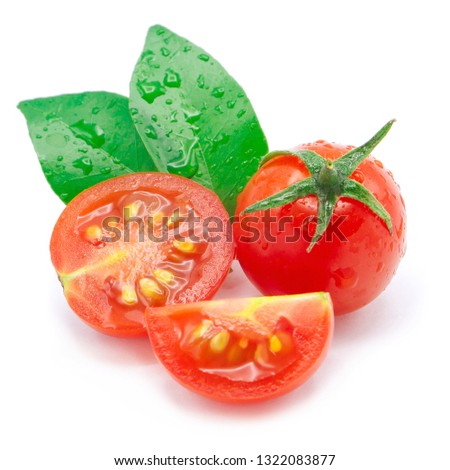 cherry tomatoes and slice with water drop isolated on white background.
