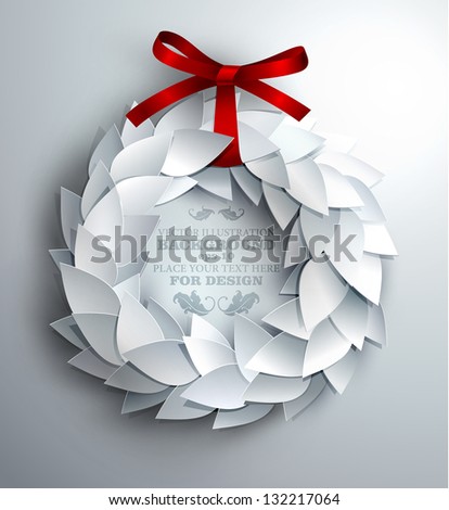 white wreath made of paper leaves decorated with red bow