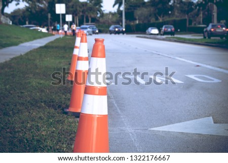 View on street road and safety cone in modern city