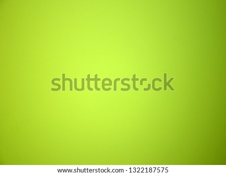 Light green blurred solid color background. Texture, gradient, vignetting, close-up.
