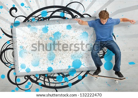 Skateboarder mid ollie in front of copy space screen with blue paint splashes and black decorative frame