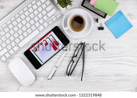 Items for business on a light background on the table, view from the top