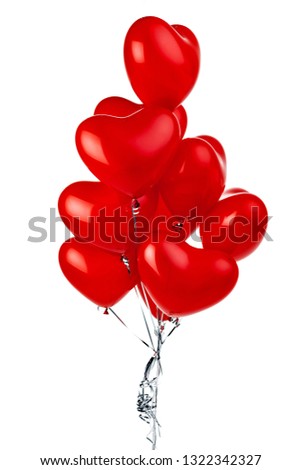 Air Balloons. Bunch of red heart shaped foil balloons