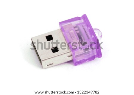 USB flash mini drive purple closeup isolated