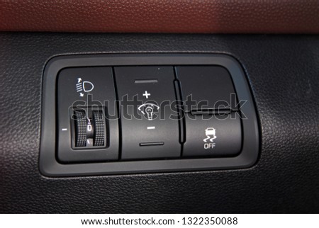 panel with buttons on the control panel of car