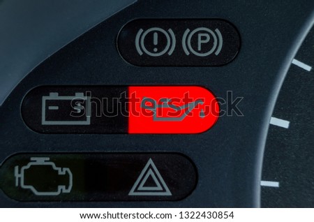 Screen symbols battery and Oil lamp warning light in-car dashboard