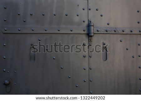 Closeup shot of iron gates outside. Copy space