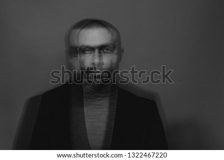 Business or theatre. Monochrome double exposure with a young man. Photo camera effect