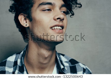 Stylish Man In Blue Shirt With Earring Isolated On White Images