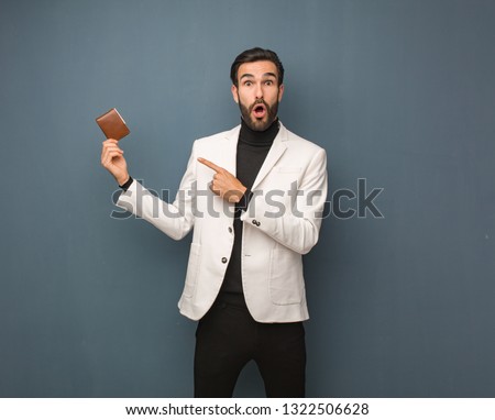 Business man pointing to the side