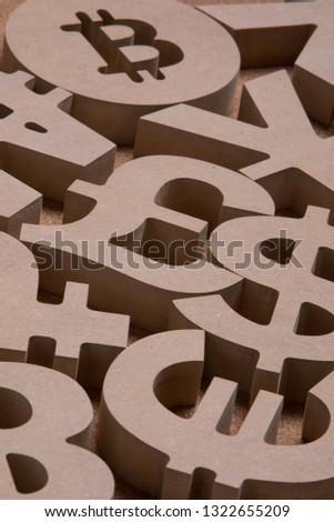 Various Wooden Sings or Symbols of World Currencies in Group Picture Dark Deep Shadows