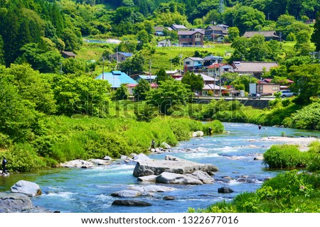 Japanese rural area in summertime.This place is Kesengawa River.Rikuzentakata Iwate Japan.Early July. Royalty-Free Stock Photo #1322677016