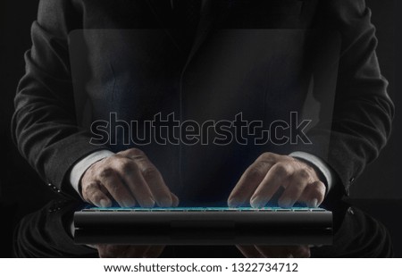 Business man working in office and icons appearing