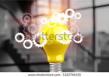Hand holding light bulb and cog inside. Idea and imagination. Creative and inspiration. Innovation gears icon with network connection on metal texture background. Innovative technology industrial.