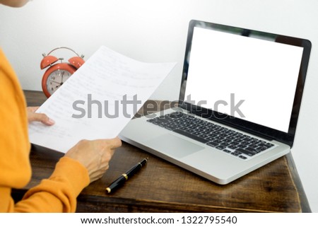 Attractive Young beautiful entrepreneur Woman smiling and looking at laptop screen, Working from Home 