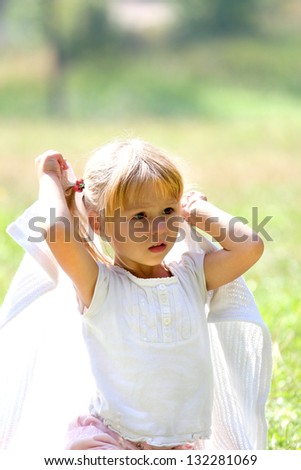 beautiful little girl in nature,