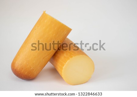 provolone cheese on a white background Royalty-Free Stock Photo #1322846633