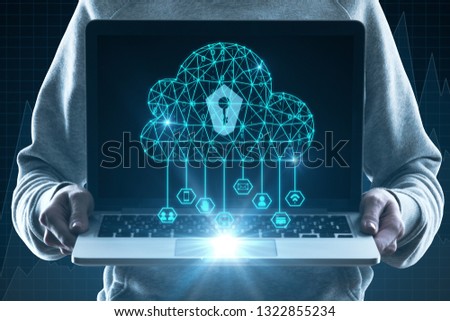 Hands holding laptop with glowing polygonal cloud and keyhole. Cloud computing and internet safety concept. Double exposure 