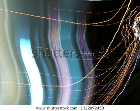 Blurred light effects. Neon glow. Festive decoration. Abstract background.