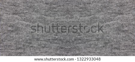 Gray natural fabric texture background banner. Grey cloth pattern of casual lifestyle modern clothing material design, close up top view with empty copy space
