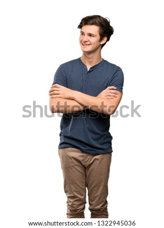 Teenager man Happy and smiling over isolated white background