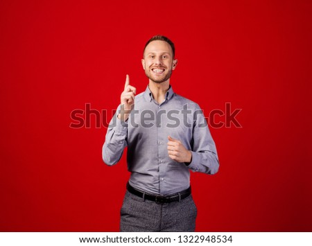 Man having an idea. emotions, facial expressions, feelings, body language, signs. image over red background. people and emotion concept.