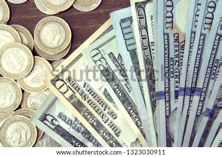 Panorama of US dollars banknotes texture. Texture US dollars. Background of different kind dollar bills, metal money.