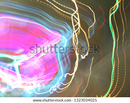 Blurred light effects. Neon glow. Abstract background.