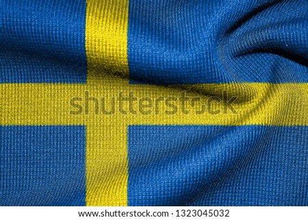 Flag Of Sweden. Warm jumper. Texture, illustration of the Kingdom of Sweden