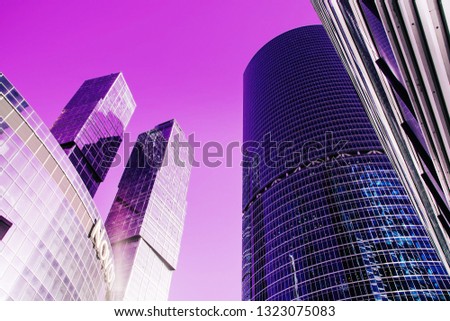 Futuristic landscape of silhouettes of skyscrapers in the city. Toned image.