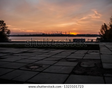Sunrise over the industrial panorama of Zaporizhia, Ukraine. Zaporizhia (Zaporozhye) is known as metallurgical industrial center of southest Ukraine.