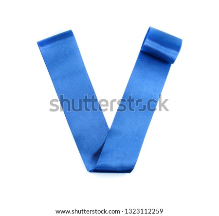 Blue fashion ribbon on white background. Letter V from blue silk strip. Alphabet.