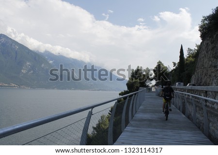 Bicycle road and footpath over Garda lake in Limone sul Garda, Lombardy, Italy