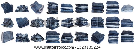 Collection of folded jeans isolated on white background