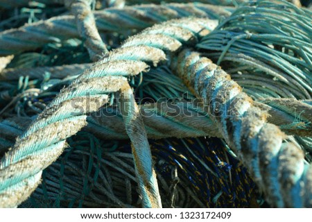 Ropes, cables and colorful fishing nets