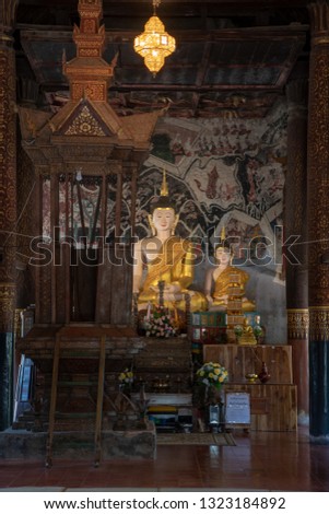 Beautiful Buddha with ancient wall painting in Rong Ngae temple, Thailand.