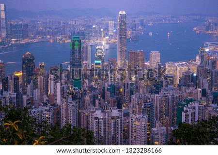 Hong Kong city skyline day to night.