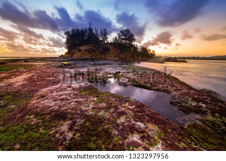Beautiful view of rocky hill at Tip of Borneo during sunrise. Tip of Borneo also known as Tanjung Simpang Mengayau by the local is the northernmost tip of Borneo Island.