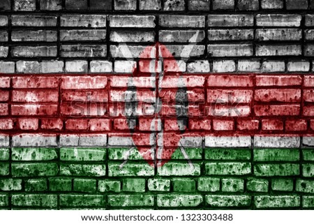 National flag of Kenya on a brick background. Concept image for Kenya: language , people and culture.