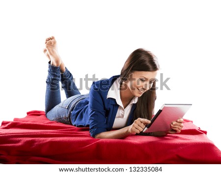 Beautiful girl with tablet is isolated in her room