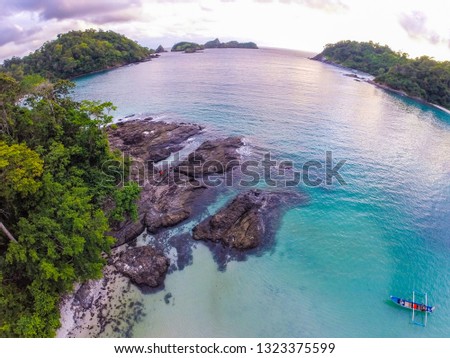 little bit lower angle aerial picture of Wedi Ireng Beach in Banyuwangi, Indonesia