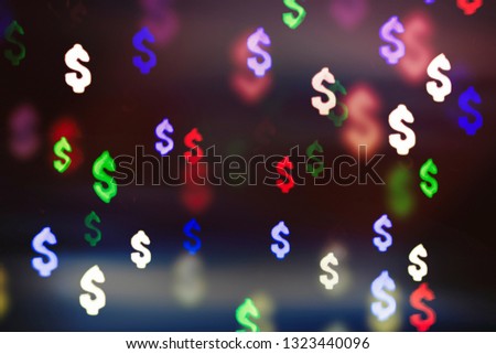 Bokeh in the form of a dollar sign. The concept of wealth and money, trading on the stock exchange and economic growth, rich.