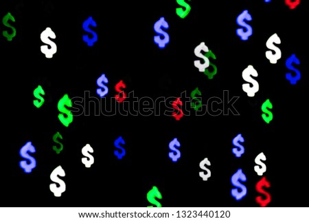 Bokeh in the form of a dollar sign. The concept of wealth and money, trading on the stock exchange and economic growth, rich.